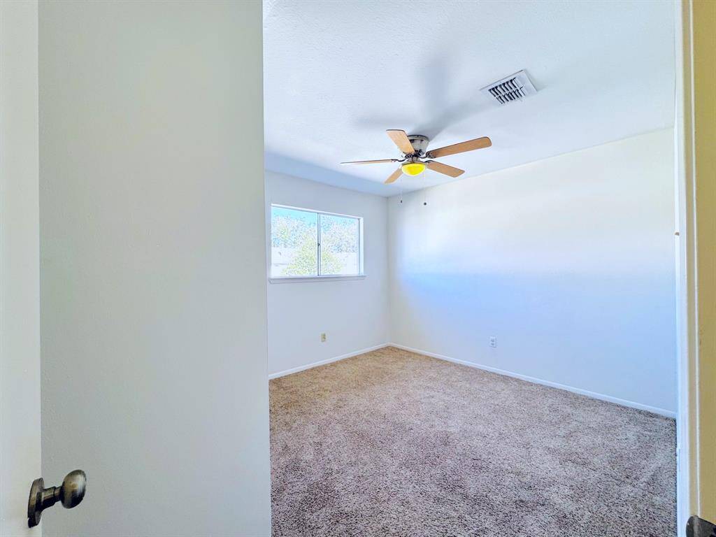 A peaceful space with neutral tones, ready for personalization to make it your own.