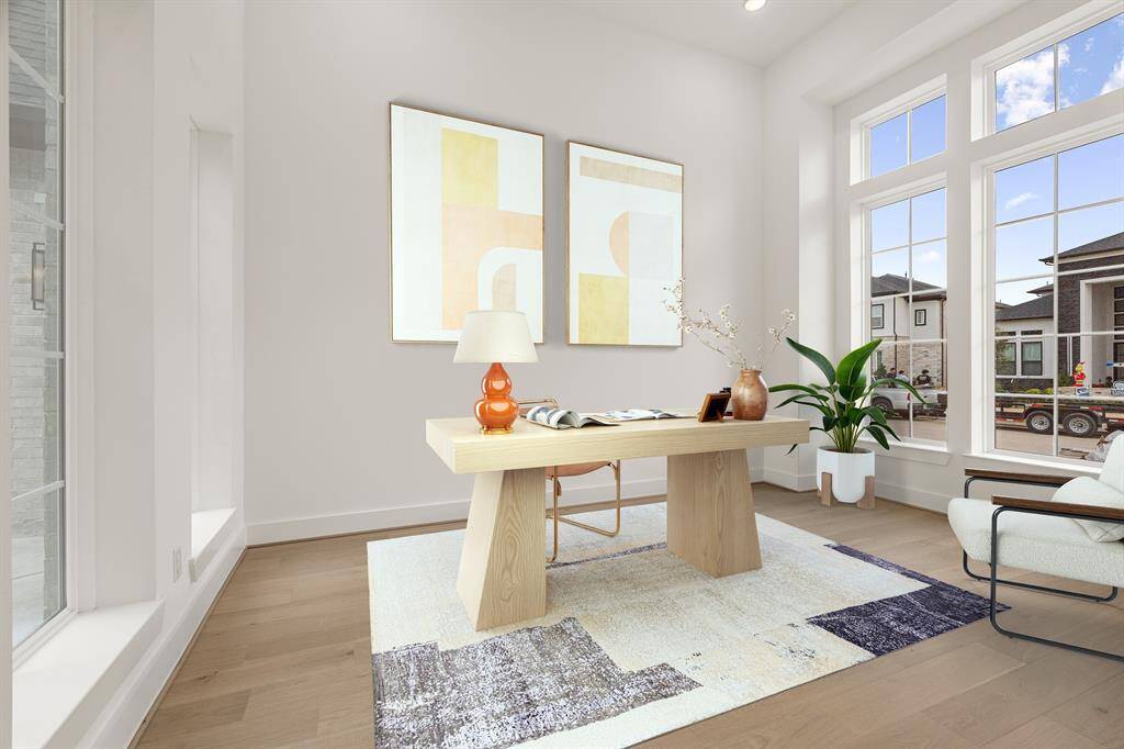 OPEN AND BRIGHT FRONT STUDY - VIEWS OUT AND INTO COURTYARD - BEAUTIFUL WOOD FLOORING