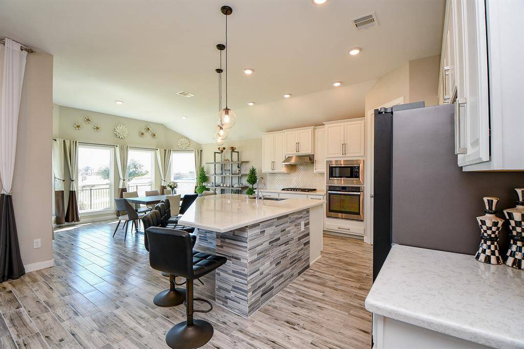 All updated tile in the kitchen and main living areas