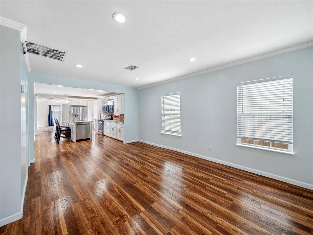 Bright and airy open-concept living space with seamless flow.