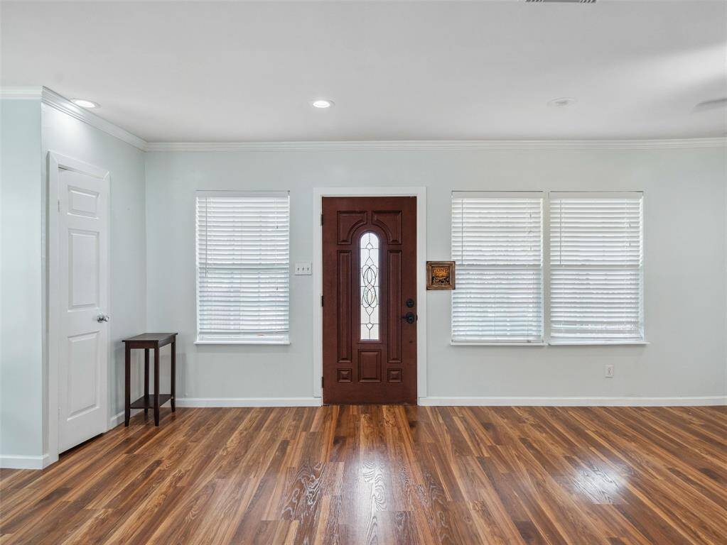 A spacious entrance, coat closet, and plenty of windows.