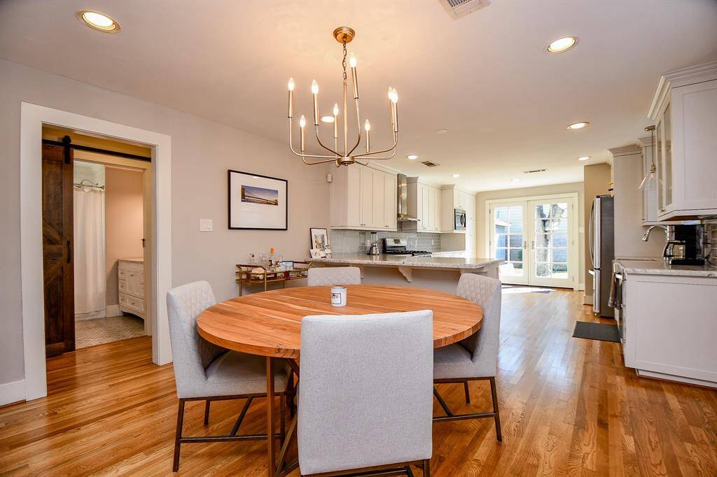 Another view of the dining room to kitchen and hallway.