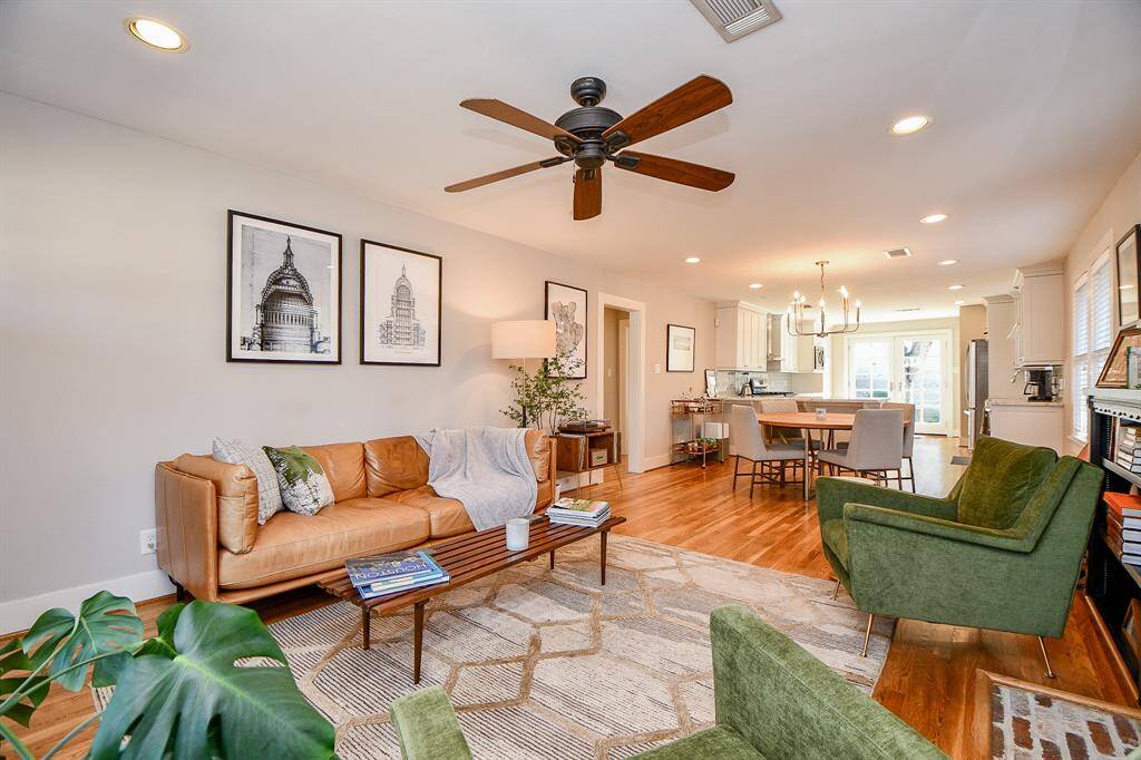 The living area is open to the dining area and kitchen.