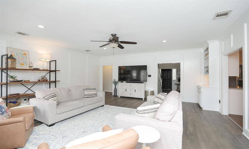 The open floor plan leads to adjacent areas, enhancing the flow of the space.
