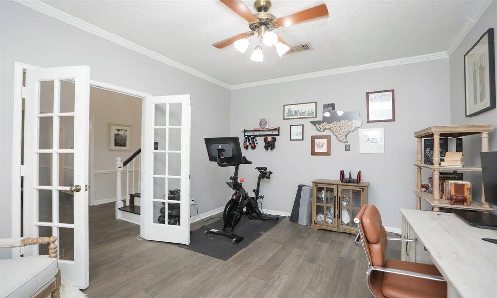 The office is a versatile room with French doors.