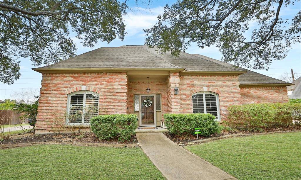 The property features a classic design with large front windows.