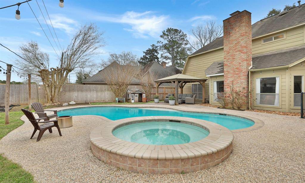 A pool and spa, cozy gazebo with seating, and no back neighbors.
