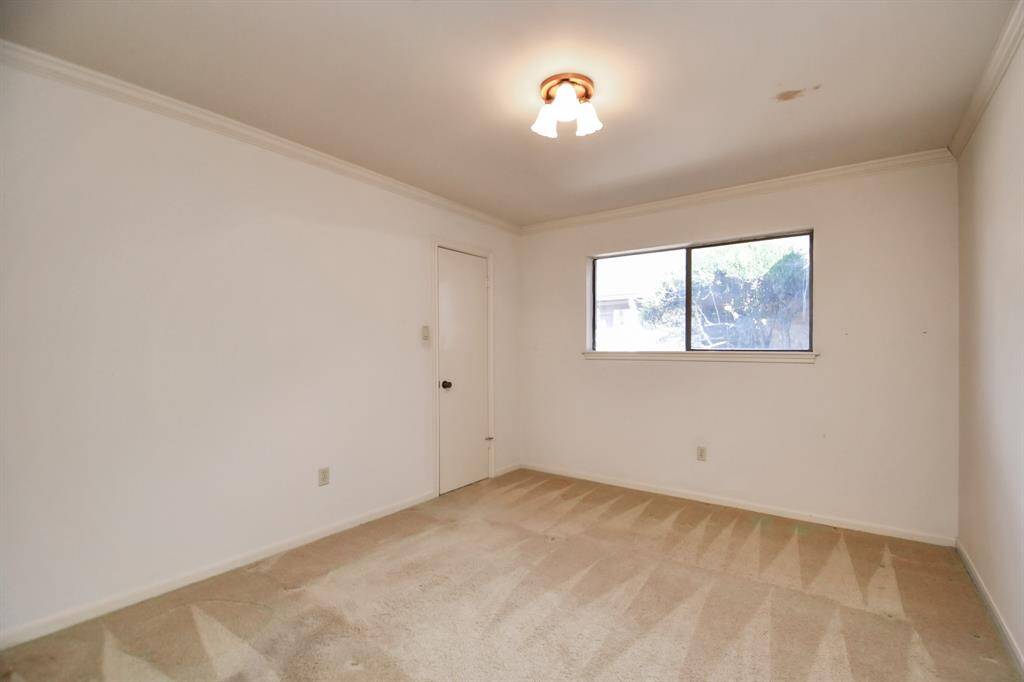 Another guest bedroom with walk in closet. This room overlooks entry courtyard.