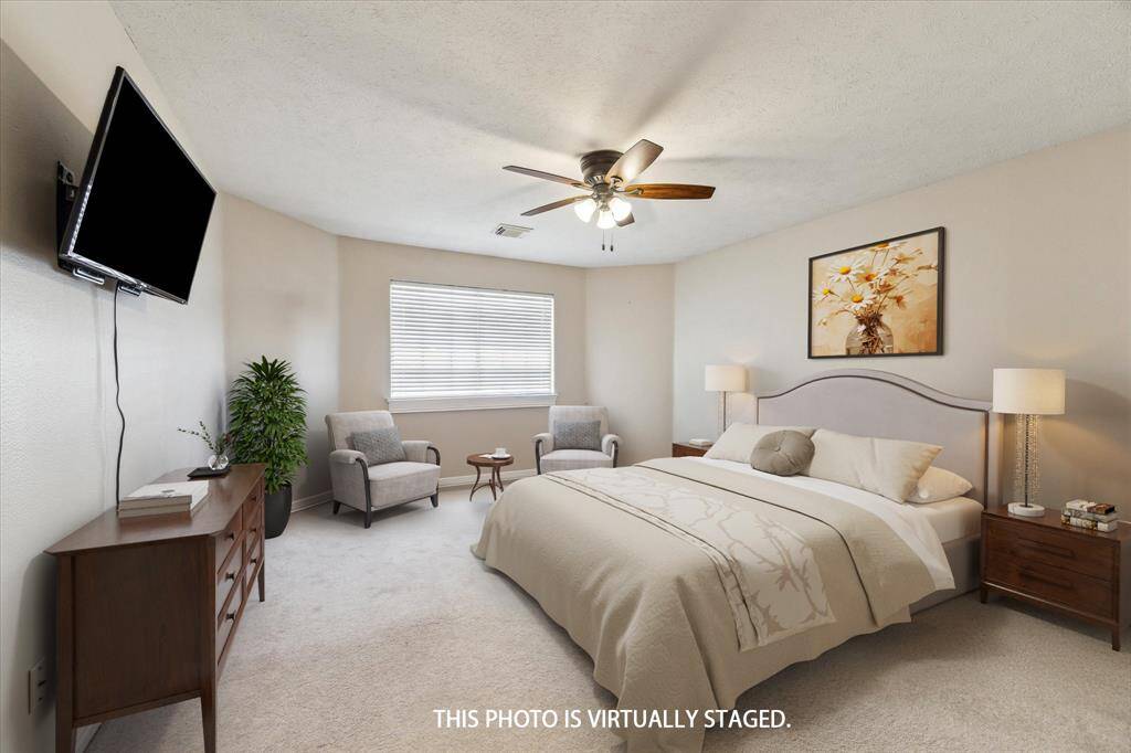 This forth large bedroom overlooks the backyard. All bedrooms have walk-in closets!