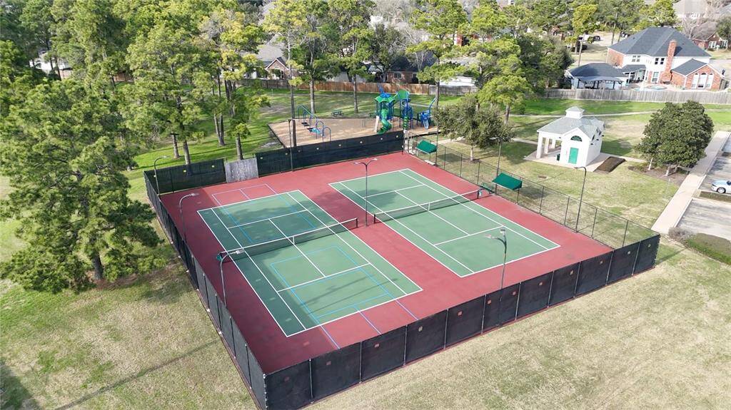 Next to the park is another set of tennis courts and a pickleball court.
