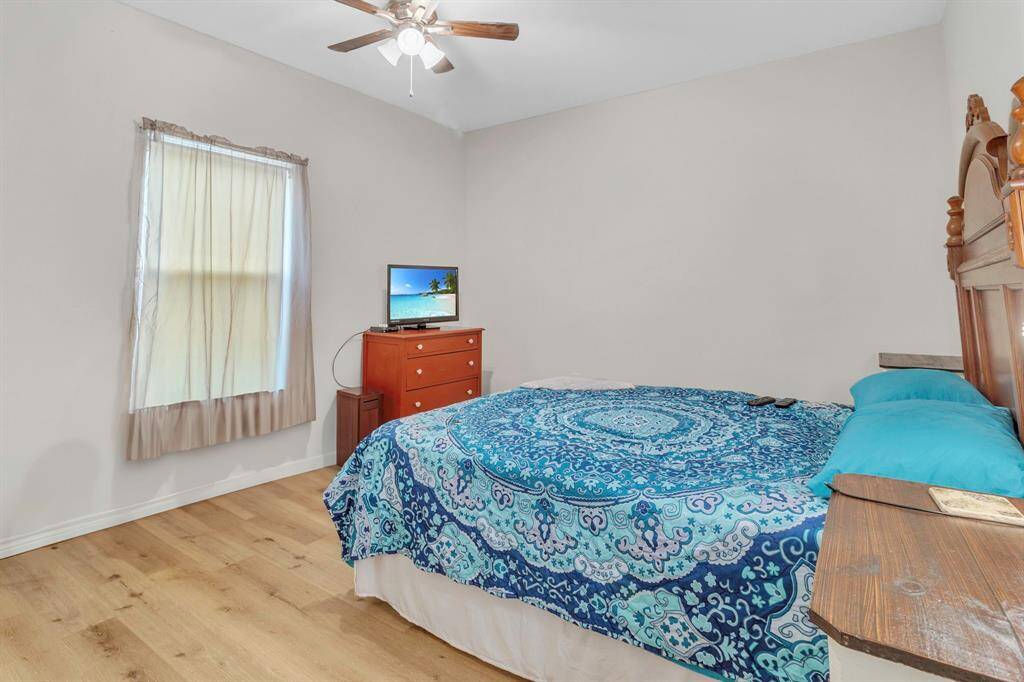 Spacious secondary bedroom with generous storage.