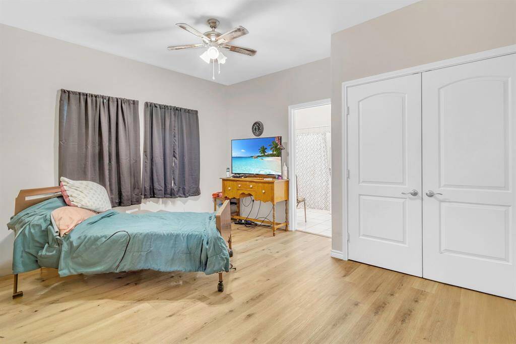 Spacious primary bedroom with private ensuite.