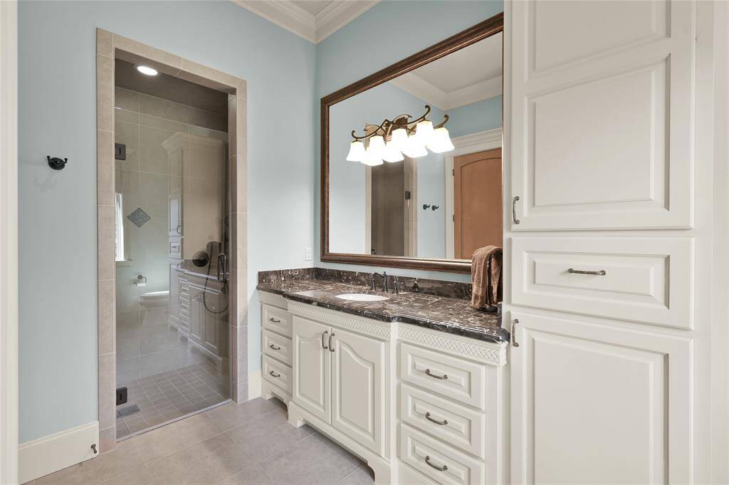The en-suite bath completes the guest suite offering full comfort and privacy.