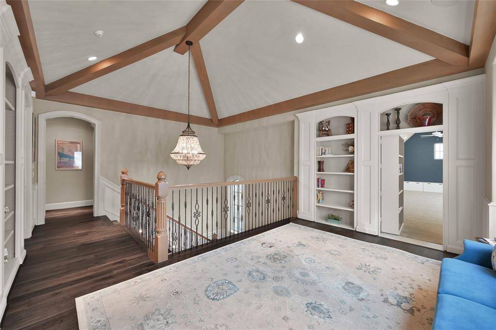 The library landing features a secret bookshelf that opens into a hidden room!