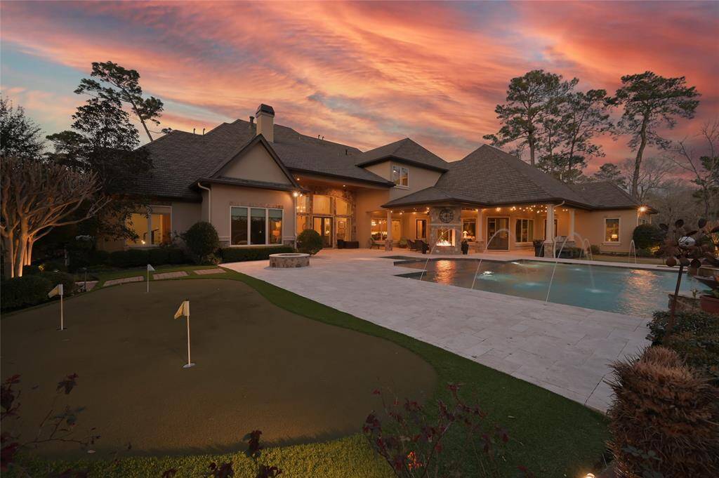 And saving the best for last! Enjoy hours of outdoor fun practicing your putts,  splashing in your resort-style infinity pool, hanging around the wood burning fire pit or enjoying a meal al fresco in your outdoor living and kitchen area.