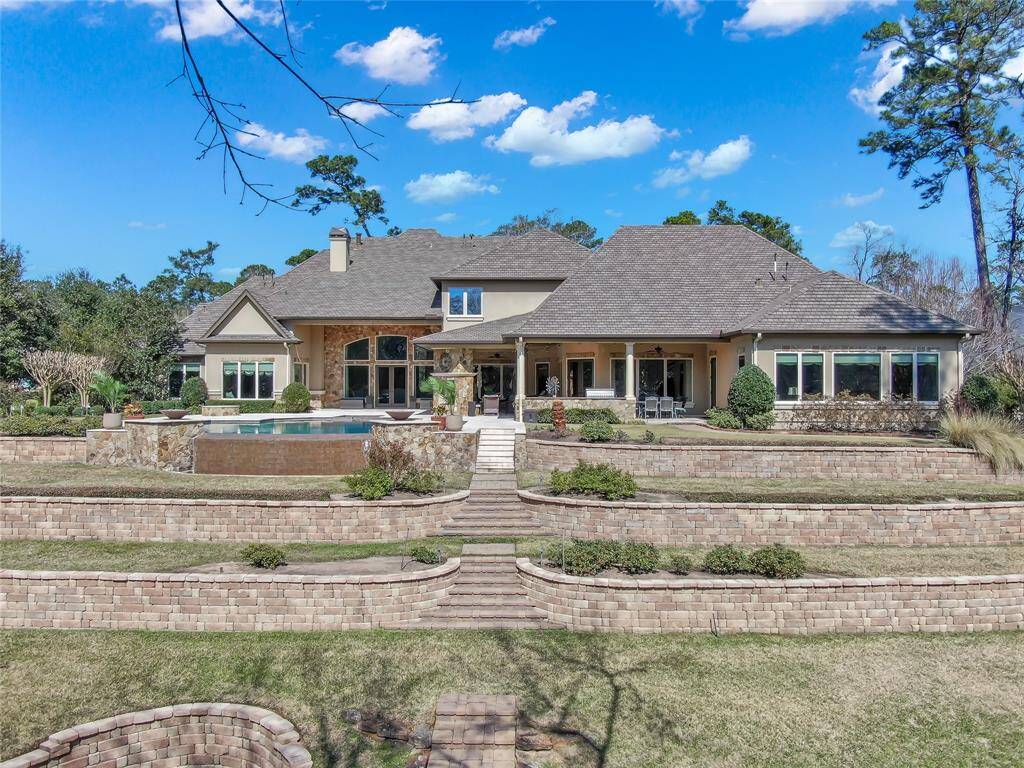 Professionally designed, tiered landscaping create an elegant and finished design to this incredible property.