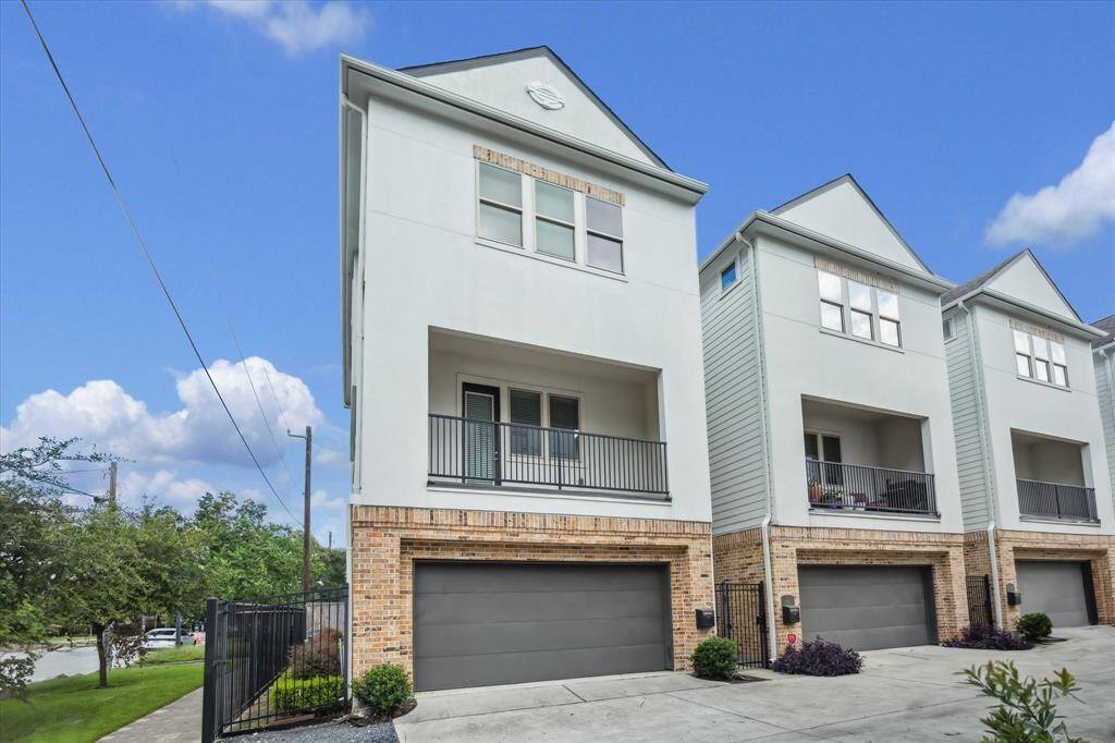 Experience luxury living in this stunning modern 3-story home