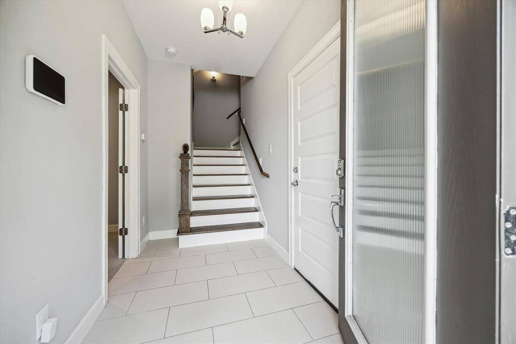 View from the front door. Secondary bedroom with en-suite bathroom to the left