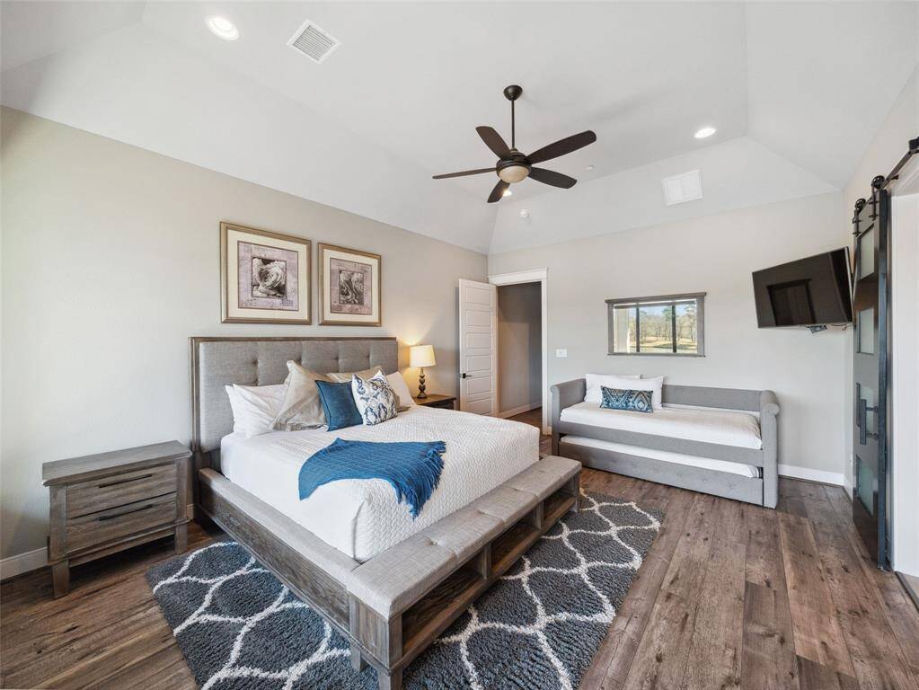 PRIMARY SUITE Alternate view with room for a trundle bed.