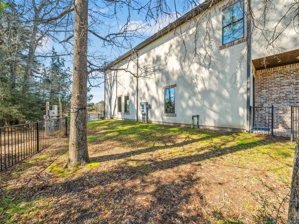 PRIVATE YARD Fully fenced to keep your pets safe. Runs the full length of the townhome. Amazing offering. Low maintenance living of a townhome with what you would miss most from a single family home.