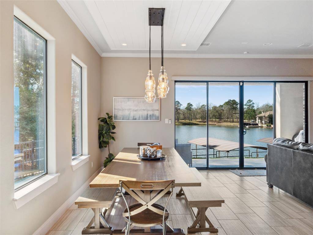 DINING ROOM  Custom ceiling designates the space with gorgeous views all around!