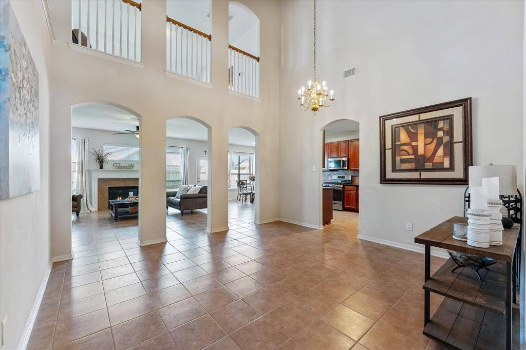 Open floor plan with soaring ceilings, tons of natural light.