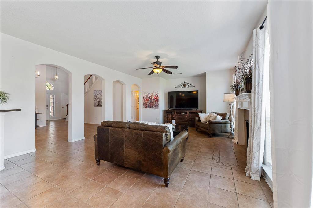 The living room is open to the dining for easy entertaining