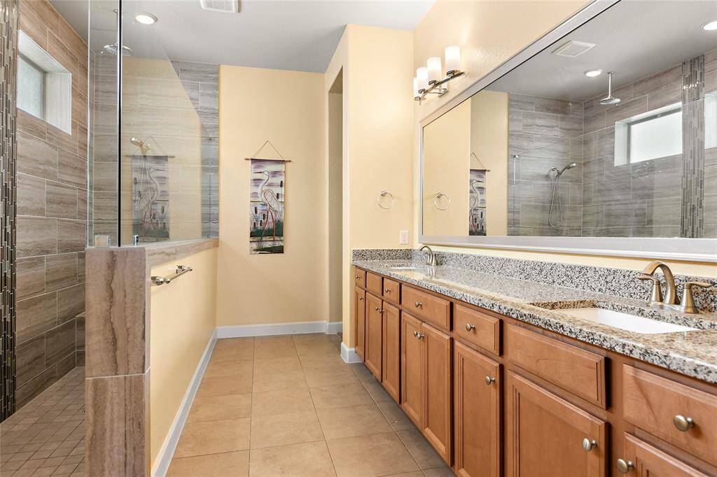 Featuring double sinks and...