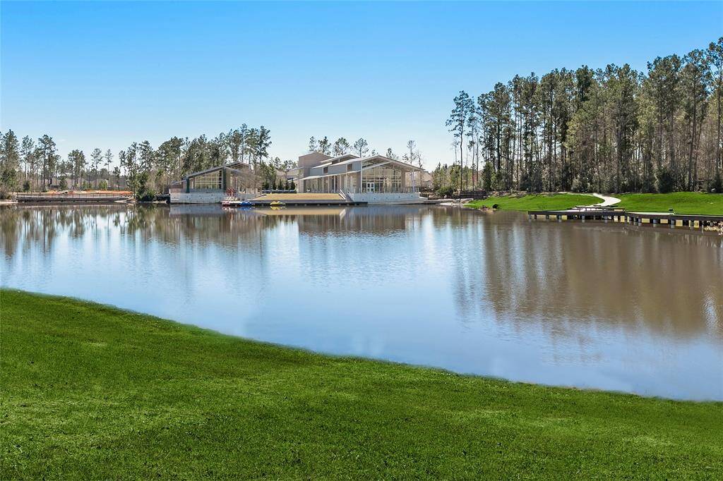 Neighborhood pond and clubhouse all conveniently located near your home.