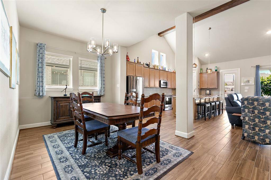 Formal dining room opens to the family room of this remarkable home.