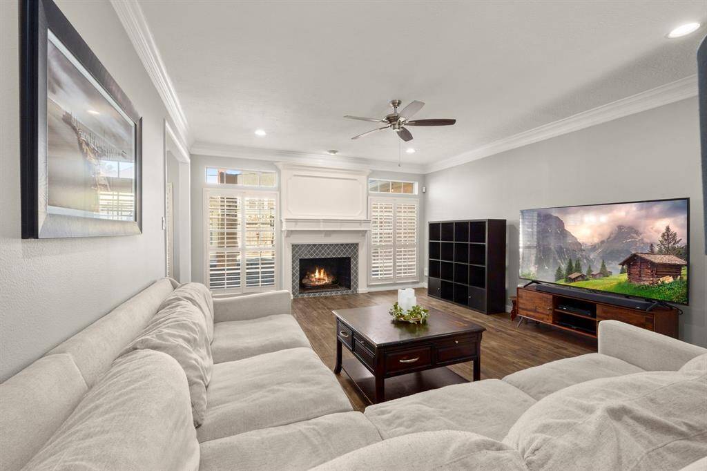 Recess lighting, a new pendant over the island, and peek-a-boo windows along the counters offer beautiful light.
