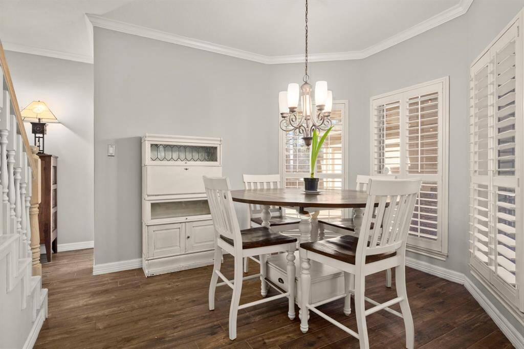 A stylish white kitchen is a classic statement and fits this home perfectly. The sink has a view over the front lawn with a deep sink and beautiful faucet.