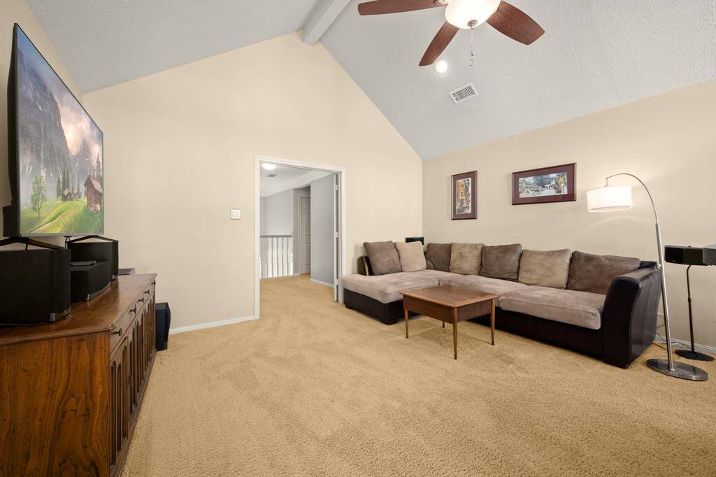 French doors allow this game room to be closed off when movie night gets a little loud.