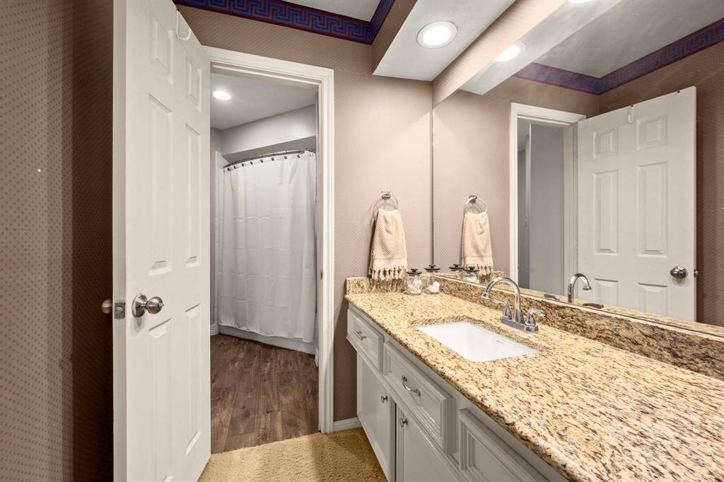 Bath 2 - Jack -n-Jill bath shared by Bedroom 2 and Bedroom 3. Each has a private vanity/sink that is separated by the tub/toilet which can be closed for privacy.