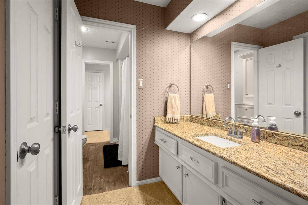 Bath 3 Jack-n-Jill - Accessed from Bedroom 3 has it's own vanity and sink. Tub/toilet room can be closed for privacy. The walk-in closet for bedroom 3 to the right.