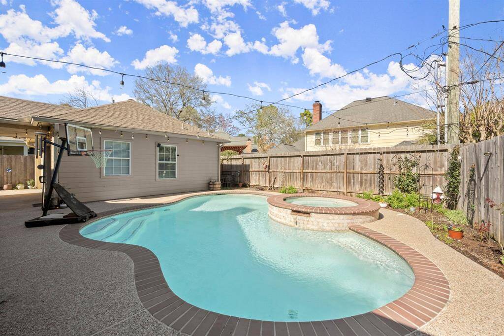 There is a small grassy area behind the garage for your pups to take care of business. Enjoy the Spring/summer bulbs and rose bushes that will color the backyard with happiness.