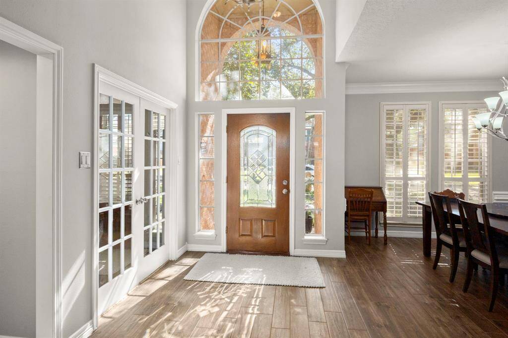 Sunlight filters from the front to the back of the home. And you'll LOVE the continuous flooring.