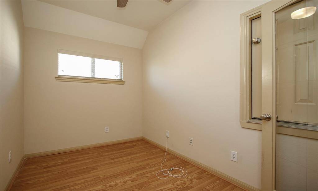 Upper study with full glass door.