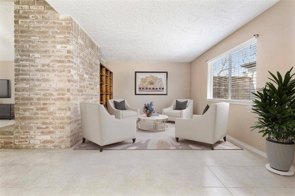 Living area or office/flex space-virtually staged