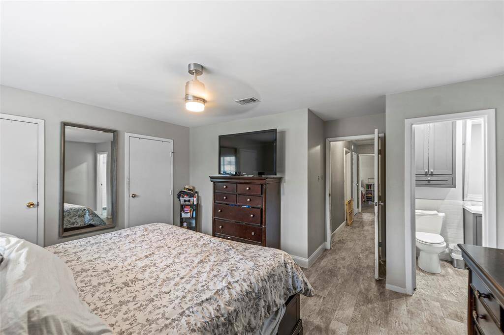 Primary Bedroom with his and her closets