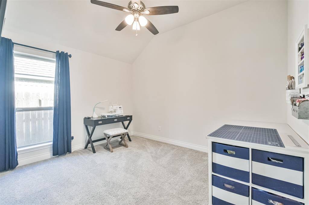 Fourth bedroom with ceiling fan