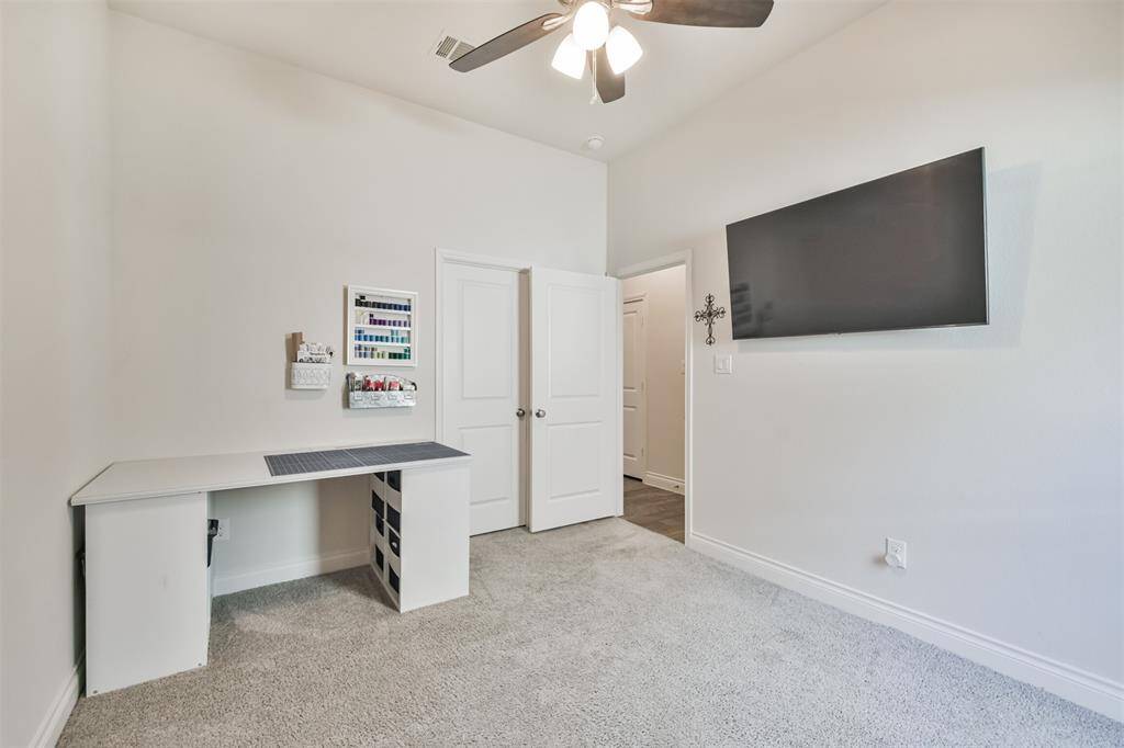 Fourth bedroom with walk-in closet.