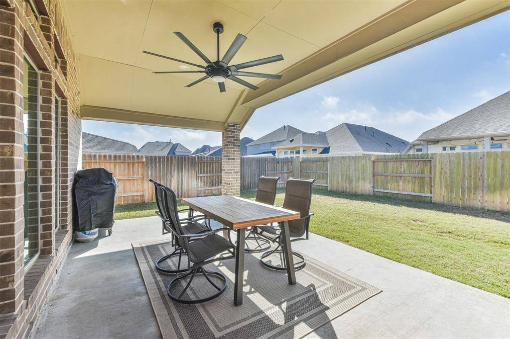 Extended covered back porch with upgraded ceiling fan