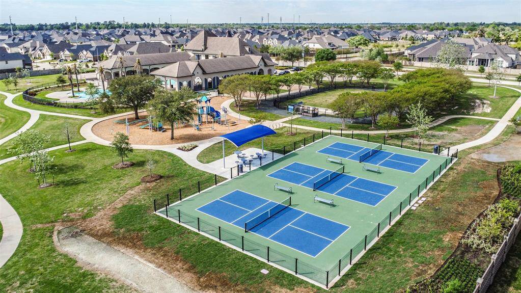 Pickleball courts, playgrounds, and dog park are part of the Amira Resort, plus multiple lakes and walking trails