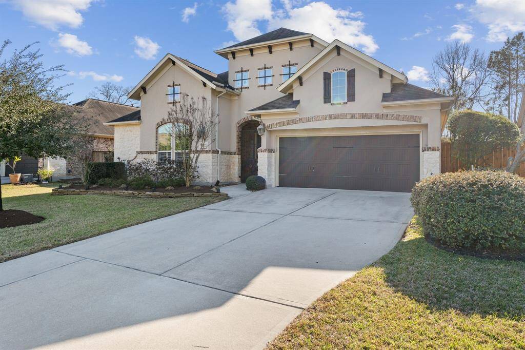 DOUBLE driveway with a 3-car TANDEM garage