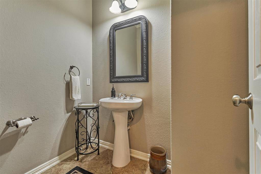 Half bath on the first floor for guests.