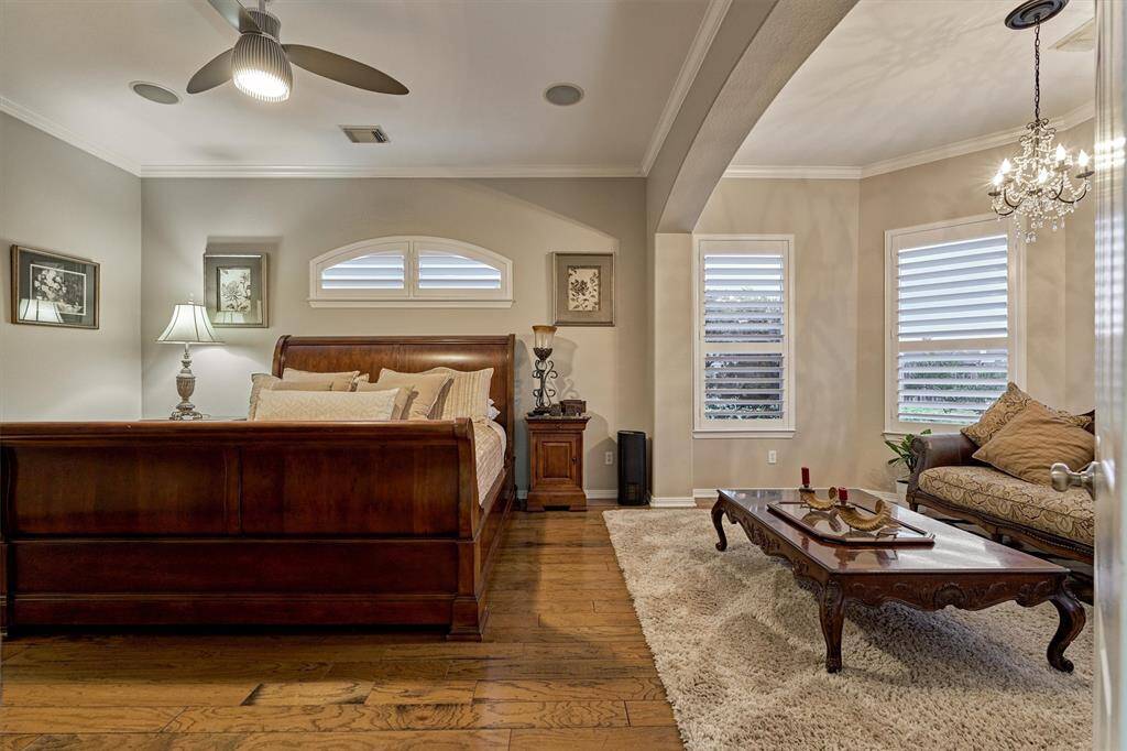 Large primary suite with a full sitting area.  Primary also has direct access to the back patio.
