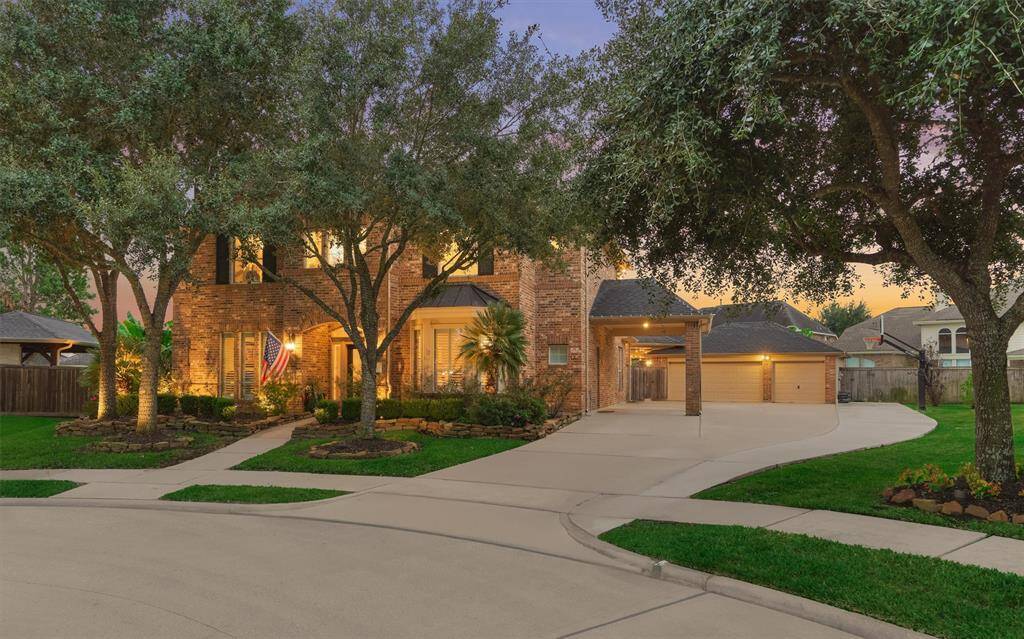 Extensive driveway and extra parking, including garage space for 3 cars.