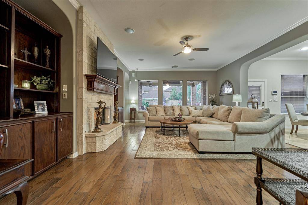View from entry into the large living area, with views out into the large backyard.
