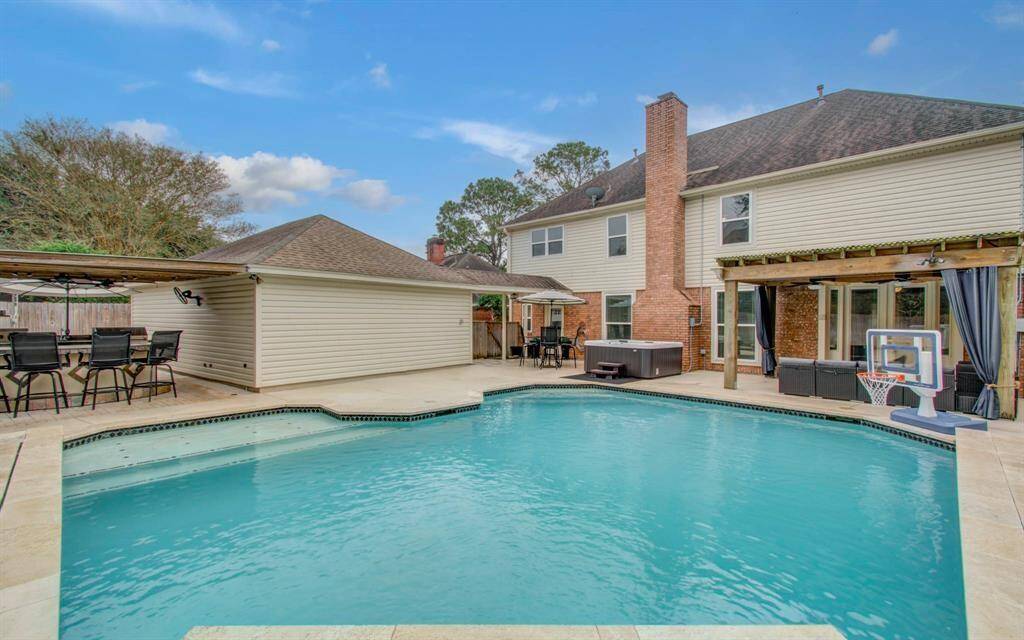 Discover your dream home with a stunning backyard oasis, featuring a fabulous pool perfect for entertaining. This spacious residence offers 4 bedrooms, 3.5 bathrooms, and a large game room, ideal for a growing family.